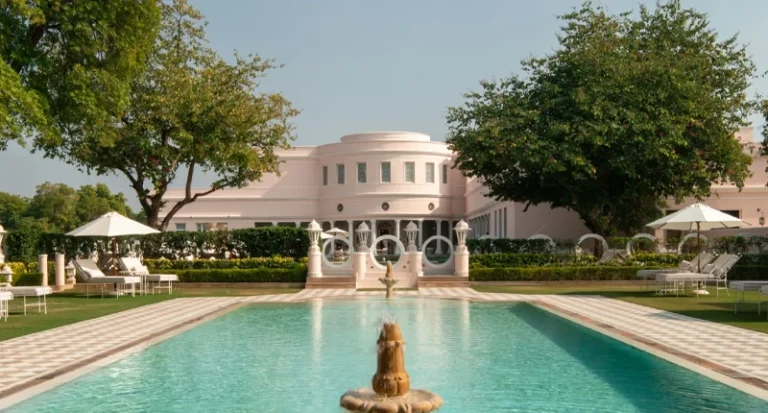 Luxury heritage hotel with a grand swimming pool and fountain