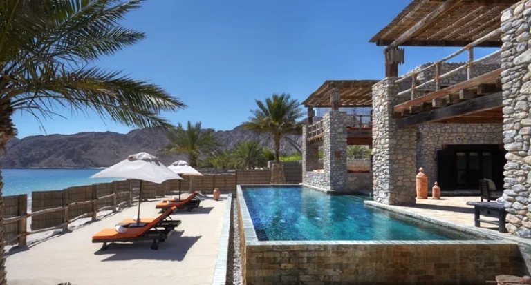Luxury stone beach villa with private infinity pool and ocean view