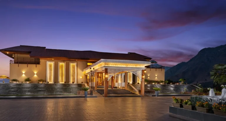 Luxury hotel resort with mountain views at sunset in India